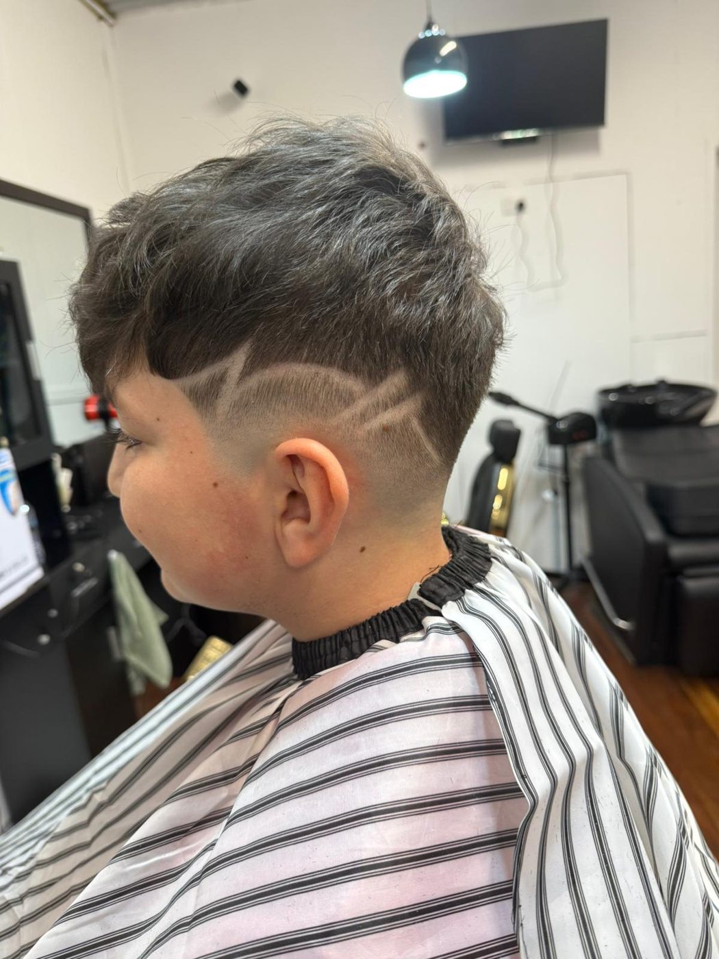 Shaved line design through a fade